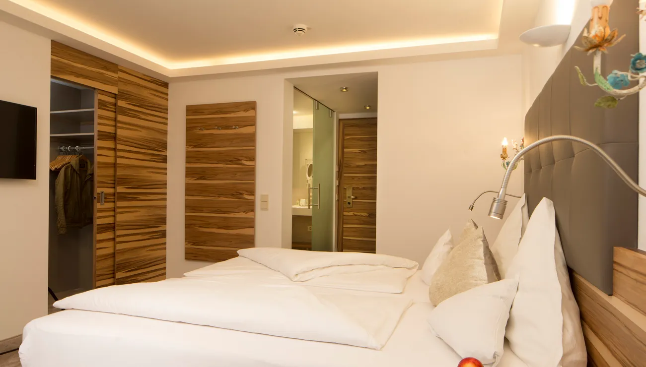 Schlafbereich im Familienappartement “Deluxe” im Hotel das Neuhaus